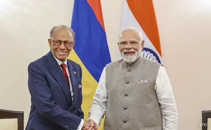7gu1rpa8 pm modi navinchandra ramgoolam pti 625x300 11 September 25 1